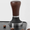 Handgehaltene Espressopresse aus Edelstahl mit Holzgriff für Kaffeesatz und Kaffeestampfer